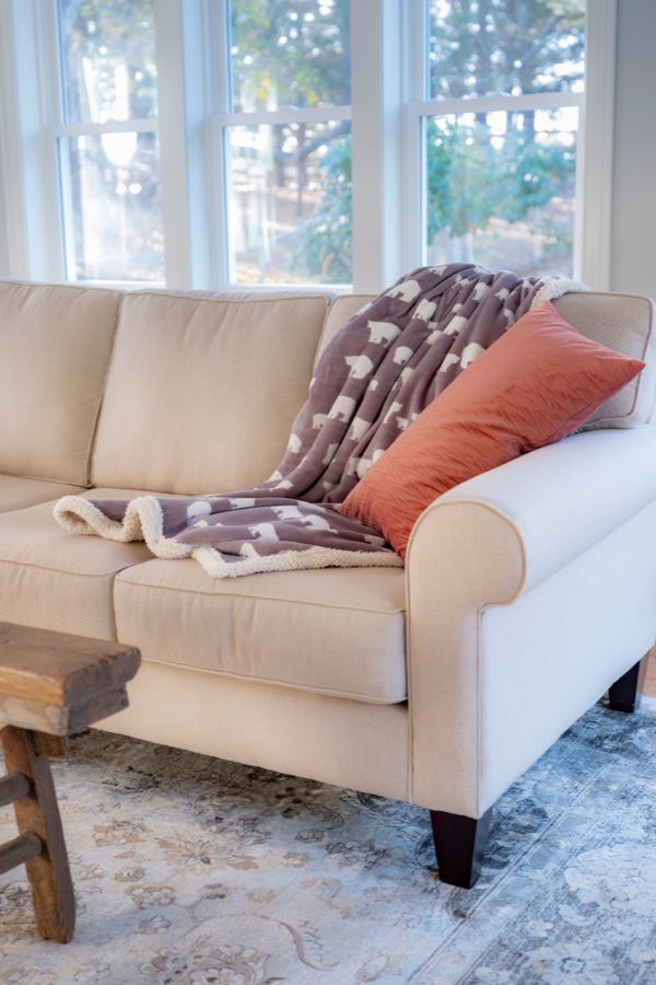 Clean microfiber couch with a magic eraser