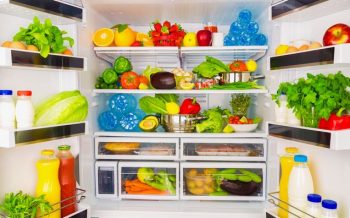 Open fridge full of fresh fruits and vegetables, healthy food background, organic nutrition, health care, dieting concept