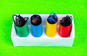 Shoe box and toilet paper rolls turned into DIY Cereal Box Organizers.