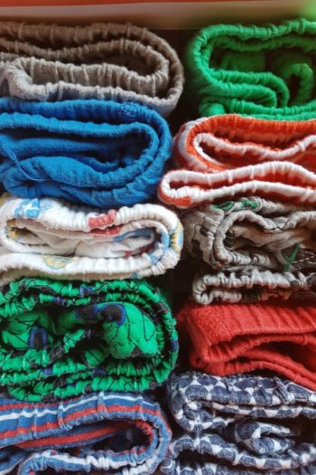 If you're trying to figure out the best ways for storing baby clothes, try rolling or folding your clothes really small. For more tips on storing baby clothes, look here. 